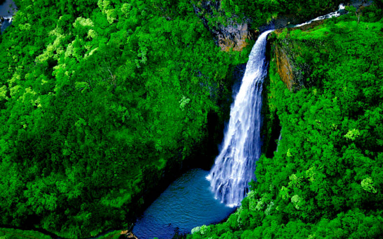 Manawaiopuna Falls, one of the many amazing attractions in Kauai.