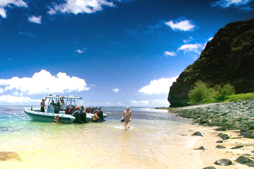 Go on a snorkeling adventure in the Napali Coast in Kauai.