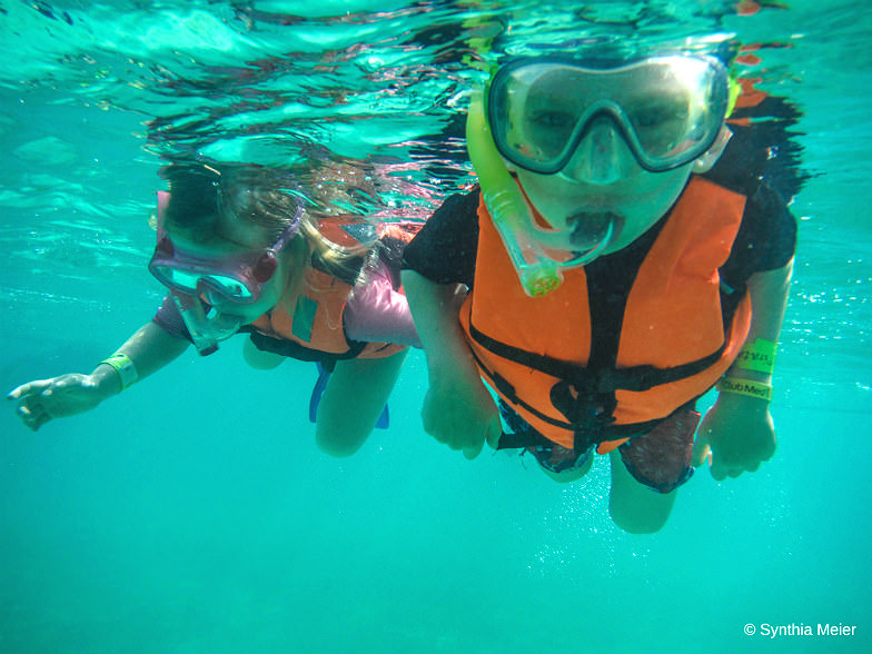 Snorkeling is just one of the many kid-friendly things to do in Cancun.