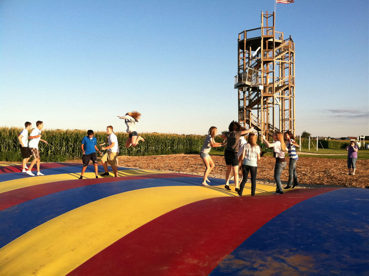 Kids at Richardson Farm in front of the world's biggest corn maze.