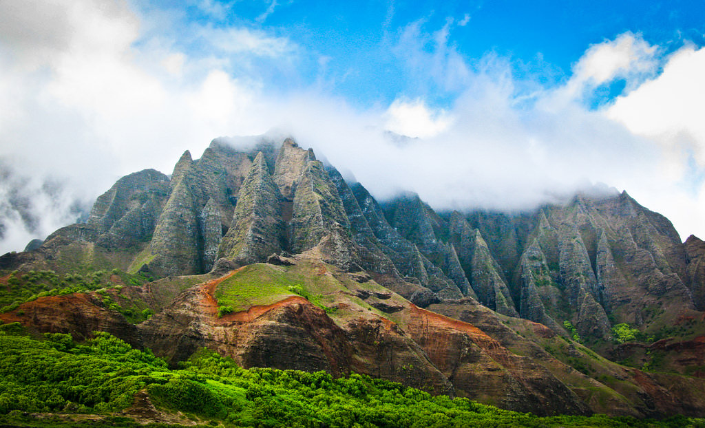 For a picturesque babymoon destination, consider Kauai's dramatic coasts and impressive peaks.