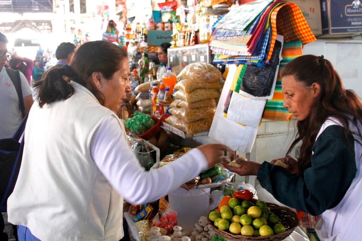 Picking up supplies at the San Pedro Market. 