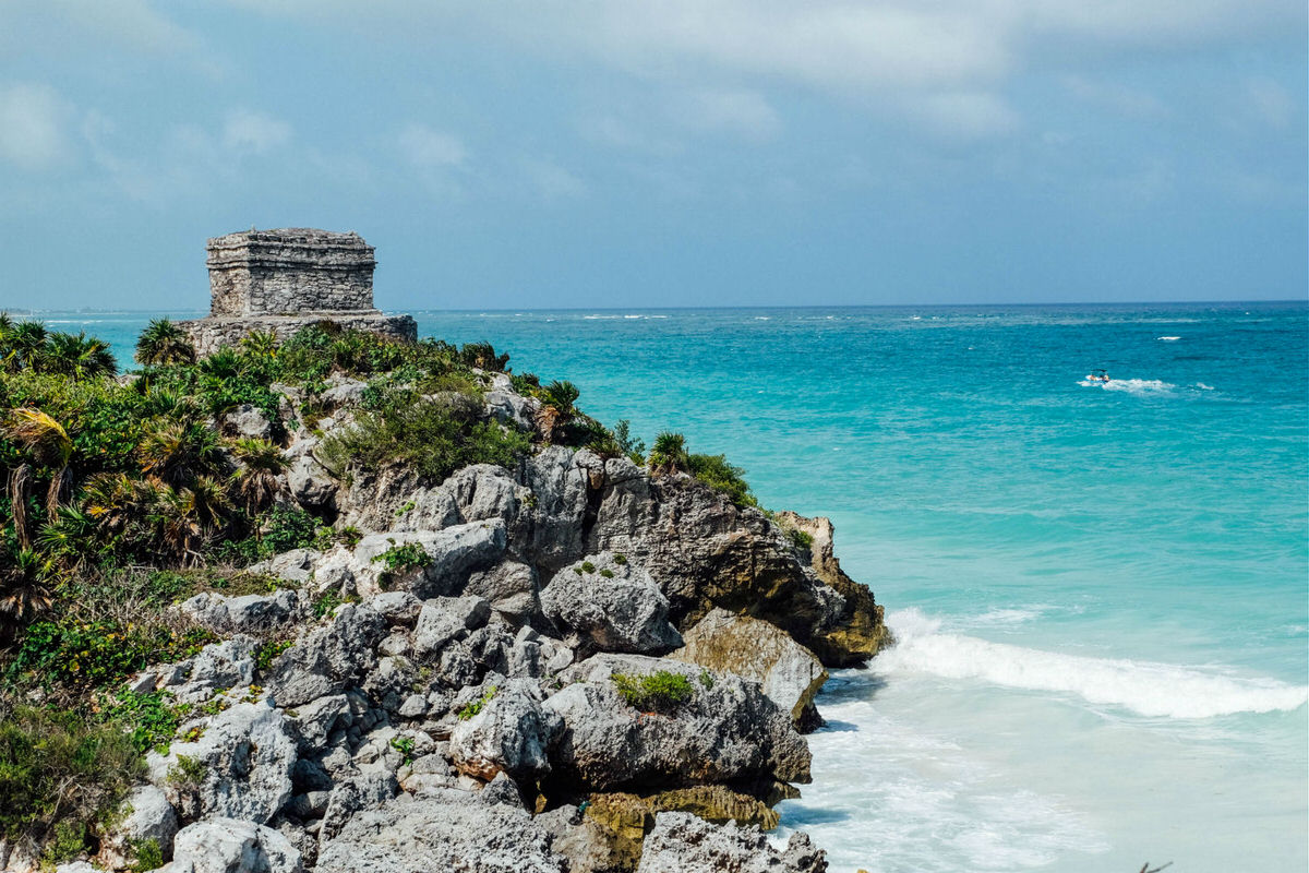 Plan a day trip to Tulum and explore Mayan ruins.