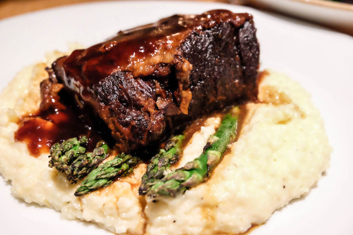 Short rib with garlic herb grits and roasted asparagus at Eats