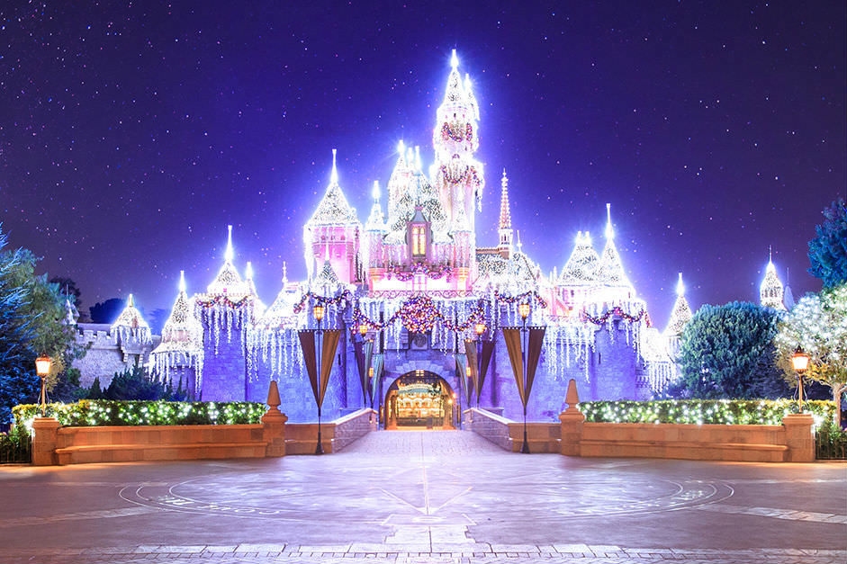 The Sleeping Beauty Castle glistens during the holiday season.