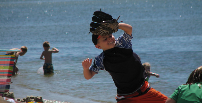 child playing baseball