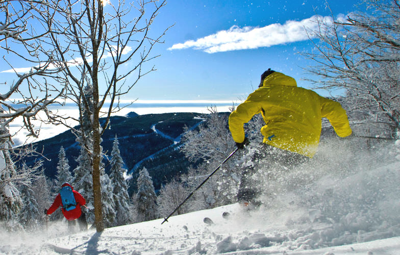 Advanced terrain and skiers at Le Massif de Charlevoix