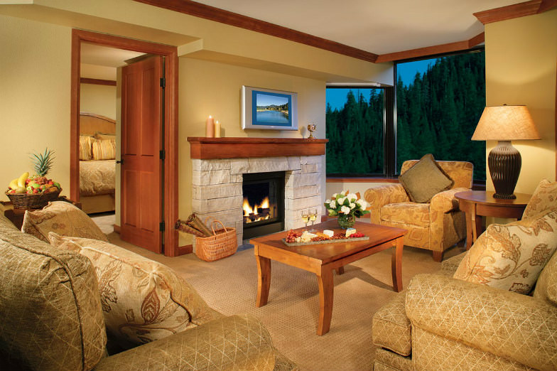 Room with a view and a fireplace at Squaw Creek