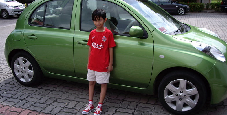 Boy with Rental Car