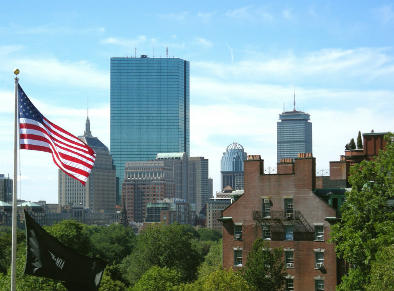 Boston skyline with the American flag