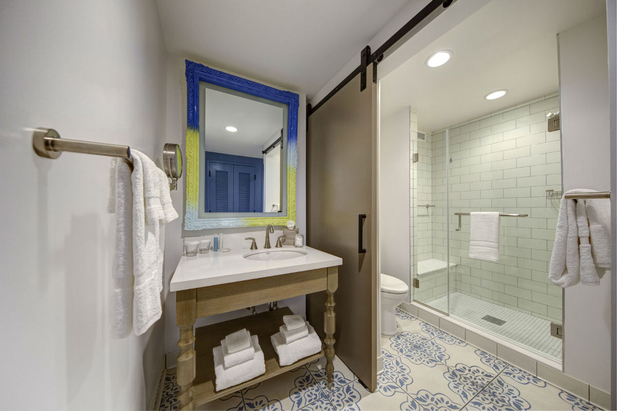 Guest room bathroom at Loews Sapphire Falls